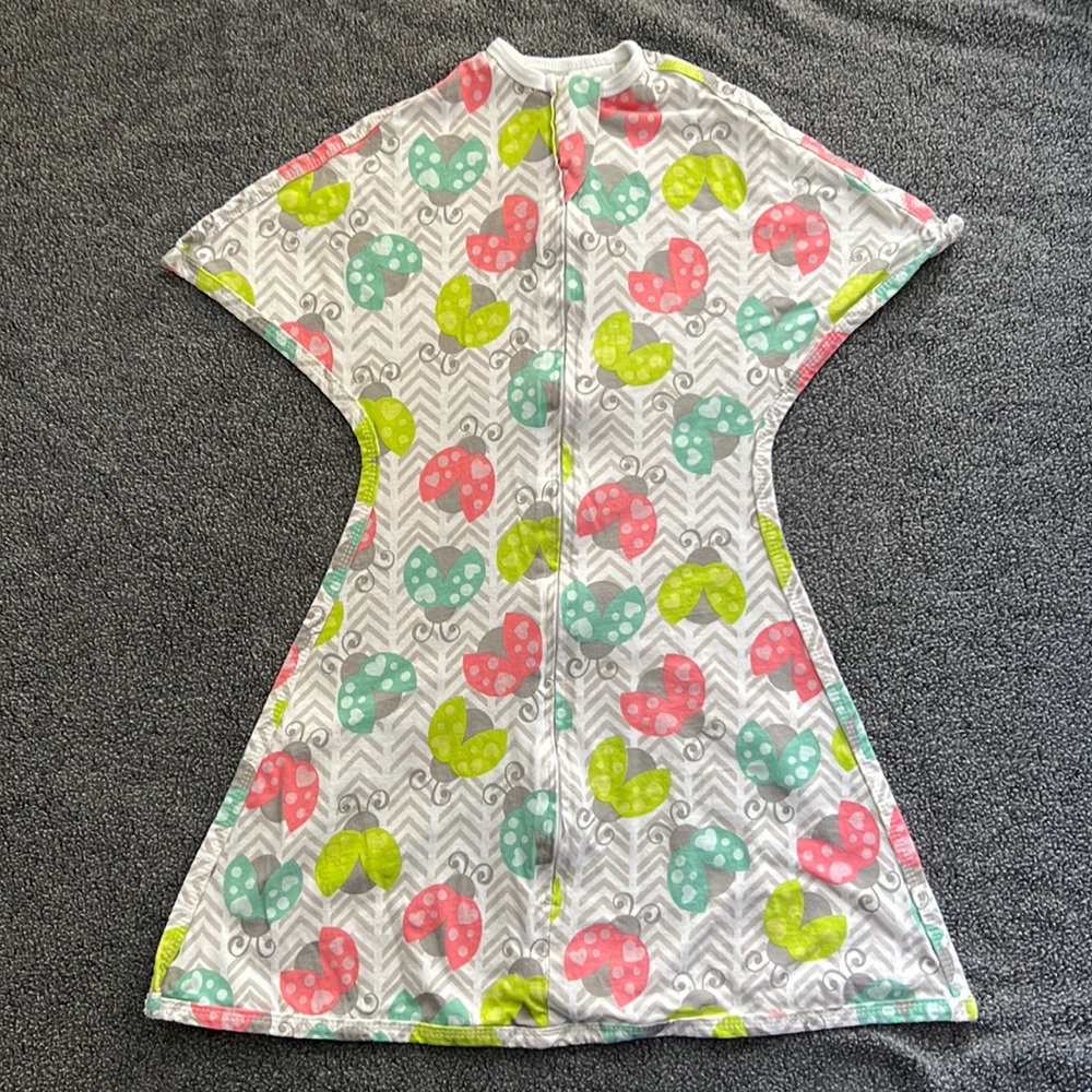Sleeping Baby brand zippadee zip. Size small (4-8months). Color is Love Bug.